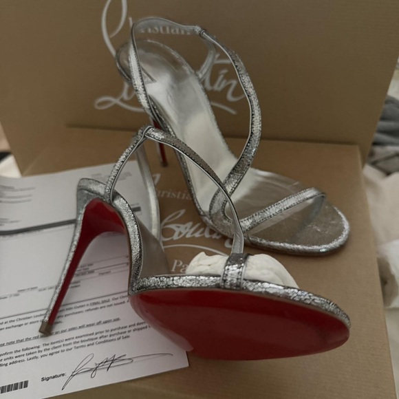 Meet the Posher Shoes - Christian Louboutin Silver Strappy Sandals with Red Soles